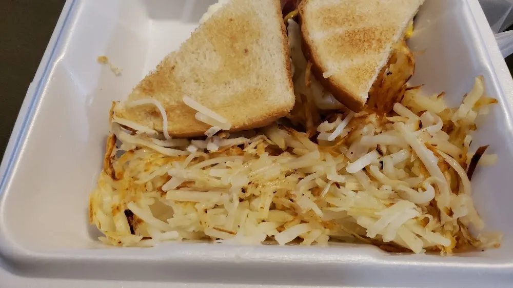 Bacon Egg and Cheese Sandwich and Hash Browns